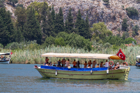 DALYAN, MUGLA, TURKEY - JULY 20, 2014: People in Dalyan river tour. River tour between Koycegiz lake and Iztuzu beach is one of the most populer activity in Dalyan.のeditorial素材