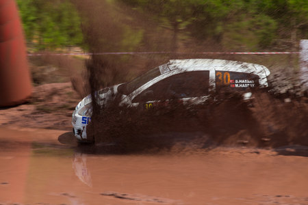 ISTANBUL, TURKEY - AUGUST 17, 2014: Billur Hasbay drives Citroen C2 car of Bonus Unifree Parkur Racing Team in Avis Bosphorus Rally, Gocbeyli Stageのeditorial素材