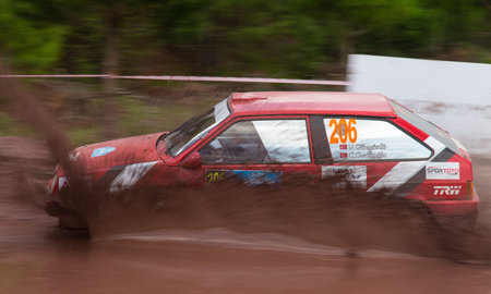 ISTANBUL, TURKEY - AUGUST 17, 2014: Umut Gungordu drives Lada Samara car in Avis Bosphorus Rally, Gocbeyli Stageのeditorial素材