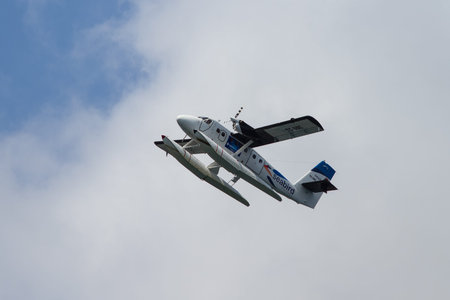 ISTANBUL, TURKEY - AUGUST 30, 2014: Seabird airlines de Havilland Canada DHC-6 Twin Otter seaplane landing to Halic estuary. Seabird airlines have 10 destinations with 4 fleet size.のeditorial素材