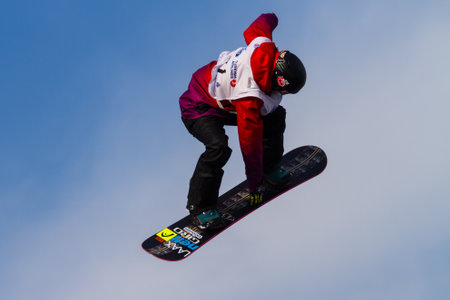ISTANBUL, TURKEY - DECEMBER 20, 2014: Sina Candrian jump in FIS Snowboard World Cup Big Air. This is first Big Air event for both, men and women.のeditorial素材