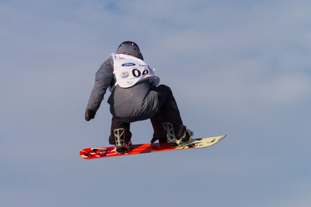 ISTANBUL, TURKEY - DECEMBER 20, 2014: Klaudia Medlova jump in FIS Snowboard World Cup Big Air. This is first Big Air event for both, men and women.のeditorial素材