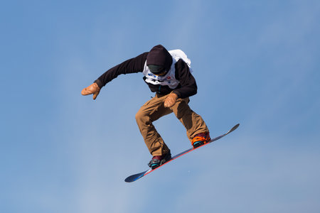 ISTANBUL, TURKEY - DECEMBER 20, 2014: Unidentified snowboarder jump in FIS Snowboard World Cup Big Air. This is first Big Air event for both, men and women.のeditorial素材