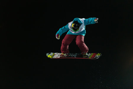 ISTANBUL, TURKEY - DECEMBER 20, 2014: Cheryl Maas jump in FIS Snowboard World Cup Big Air. This is first Big Air event for both, men and women.のeditorial素材