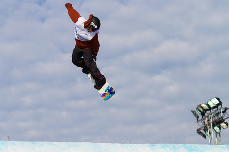 ISTANBUL, TURKEY - DECEMBER 20, 2014: Andrew Matthews jump in FIS Snowboard World Cup Big Air. This is first Big Air event for both, men and women.のeditorial素材