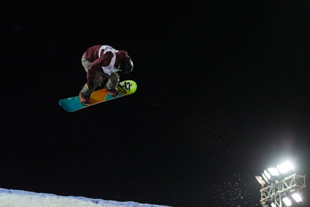 ISTANBUL, TURKEY - DECEMBER 20, 2014: Elena Koenz jump in FIS Snowboard World Cup Big Air. This is...