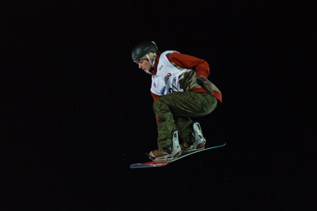 ISTANBUL, TURKEY - DECEMBER 20, 2014: Ryan Stassel jump in FIS Snowboard World Cup Big Air. This is...