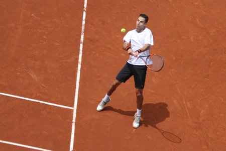 ISTANBUL, TURKEY - MAY 01, 2015: Colombian player Santiago Giraldo in action during quarter final match against Argentine player Diego Schwartzman in TEB BNP Paribas Istanbul Open 2015のeditorial素材