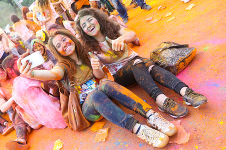 ISTANBUL, TURKEY - MAY 17, 2015: Group of friends take selfie and have fun in colors during Color Up Run, Istanbulのeditorial素材