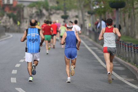 ISTANBUL, TURKEY - APRIL 26, 2015: Athletes are running in Old Town streets of Istanbul during Vodafone 10th Istanbul Half Marathonのeditorial素材