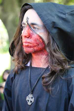 ISTANBUL, TURKEY - MAY 10, 2015: A girl participate and have fun during zombie walk Istanbul in Nisantasi Parkのeditorial素材