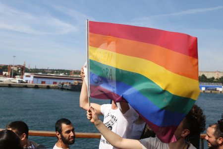 ISTANBUL, TURKEY - JUNE 28, 2015: People pass from Asian side to Taksim to participate Istanbul LGBTI Pride in Istiklal Avenueのeditorial素材