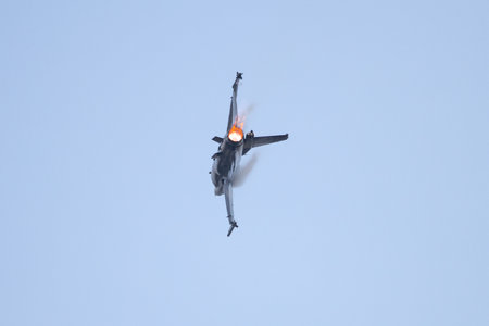 ISTANBUL, TURKEY - MAY 17, 2015: Turkish Air Force Solo Aerobatics Display Team Solo Turk performs. Solo Turk airplane is a F-16 C Blok-40 fighter jet.のeditorial素材