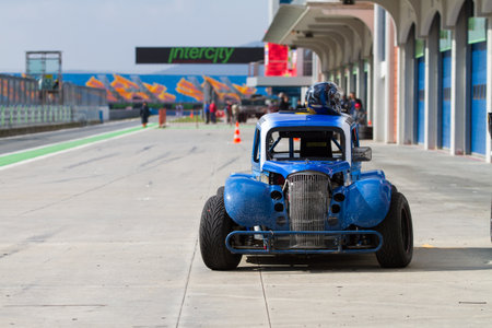ISTANBUL, TURKEY - NOVEMBER 02, 2014: A legends car in pit lane in Istanbul Park Circuitのeditorial素材