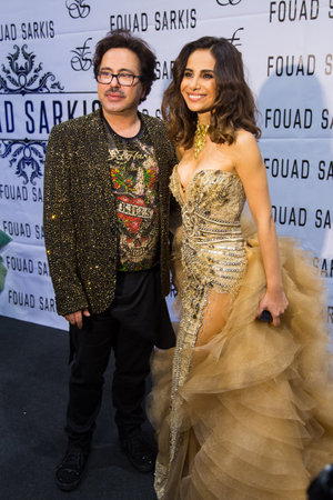 ISTANBUL, TURKEY - NOVEMBER 22, 2014: Turkish Singer Betul Demir and Fouad Sarkis after Catwalk during Fashionist fashion fairのeditorial素材