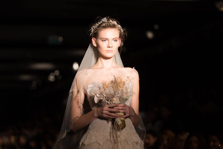 ISTANBUL, TURKEY - NOVEMBER 22, 2014: A model showcases one of the latest creations by Banu Guven in Fashionist fashion fairのeditorial素材