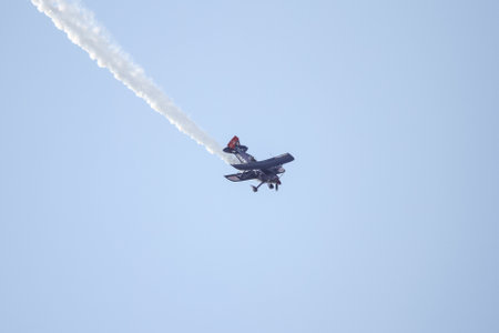 ISTANBUL, TURKEY - AUGUST 02, 2015: Ali Ismet Ozturk piloting his special biplane called Purple Violet at the TATCA Airfest 2015のeditorial素材