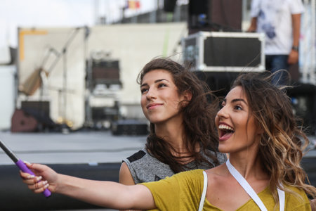 ISTANBUL, TURKEY - AUGUST 02, 2015: Romanian singers Brianna and Kate Linn take selfie in Tatca Airfestのeditorial素材