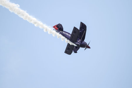 ISTANBUL, TURKEY - AUGUST 02, 2015: Ali Ismet Ozturk piloting his special biplane called Purple...
