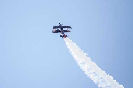 ISTANBUL, TURKEY - AUGUST 02, 2015: Ali Ismet Ozturk piloting his special biplane called Purple...