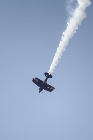 ISTANBUL, TURKEY - AUGUST 02, 2015: Ali Ismet Ozturk piloting his special biplane called Purple Violet at the TATCA Airfest 2015のeditorial素材