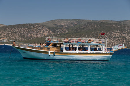MUGLA, TURKEY - JULY 16, 2015: People have fun and relaxing in boat tour around Bodrum Town,  Aegean sea.のeditorial素材