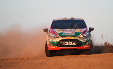ISTANBUL, TURKEY - NOVEMBER 14, 2015: Bugra Banaz drives Ford Fiesta R2 of Castrol Ford Team Turkiye in Isok Istanbul Rally 2015, Special stageのeditorial素材