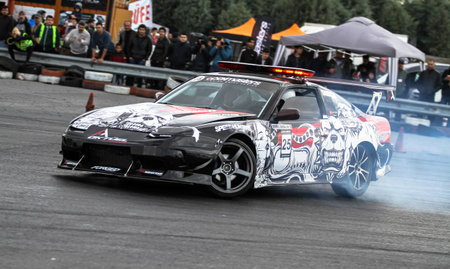ISTANBUL, TURKEY - OCTOBER 31, 2015: Ertugrul Makina drives a drift car in Apex Masters Turkish...