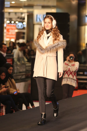 ISTANBUL, TURKEY - NOVEMBER 07, 2015: A model showcases one of the latest creations of Stores in Optimum Outlet during Optimum Fashion days catwalkのeditorial素材