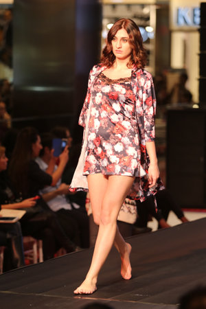 ISTANBUL, TURKEY - NOVEMBER 07, 2015: A model showcases one of the latest creations of Stores in Optimum Outlet during Optimum Fashion days catwalkのeditorial素材