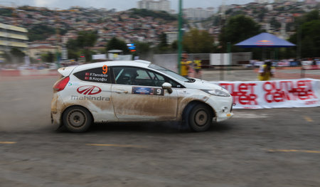 KOCAELI, TURKEY - AUGUST 22, 2015: Ferhat Tanribilir with Ford Fiesta R2 in special stage of Kocaeli Rally 2015のeditorial素材