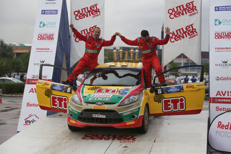 KOCAELI, TURKEY - AUGUST 23, 2015: Bugra Banaz with Ford Fiesta R2 of Castrol Ford Team Turkiye in Podium Ceremony of Kocaeli Rally 2015のeditorial素材