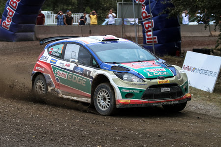 KOCAELI, TURKEY - AUGUST 23, 2015: Murat Bostanci with Ford Fiesta S2000 of Castrol Ford Team Turkiye in Kocaeli Rally 2015のeditorial素材