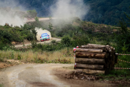 KOCAELI, TURKEY - AUGUST 23, 2015: Umit Can Ozdemir with Ford Fiesta R2 of Castrol Ford Team Turkiye in Kocaeli Rally 2015のeditorial素材