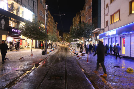 ISTANBUL, TURKEY - DECEMBER 31, 2015: Bahariye Street in Kadikoy covered with first snow of season. Bahariye Street is one of the most populer shopping area in Istanbul.のeditorial素材