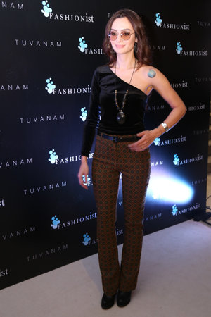 ISTANBUL, TURKEY - JANUARY 16, 2016: Turkish actress Birce Akalay poses before Tuvanam catwalk during Fashionist Fair.のeditorial素材