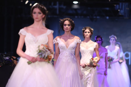 ISTANBUL, TURKEY - JANUARY 15, 2016: Models showcase the latest creations of Banu Guven during Fashionist Fair.のeditorial素材