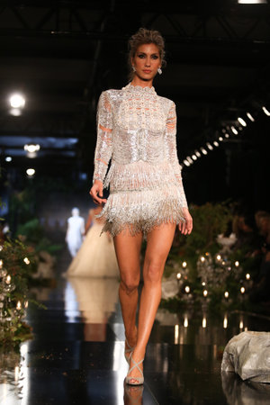 ISTANBUL, TURKEY - JANUARY 16, 2016: Turkish model Cagla Sikel showcases one of the latest creations of Tuvanam during Fashionist Fair.のeditorial素材