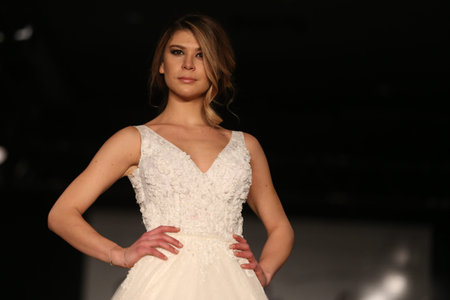 ISTANBUL, TURKEY - JANUARY 31, 2016: A model showcases one of the latest creations of Seren Moda during Weeding Fair.のeditorial素材