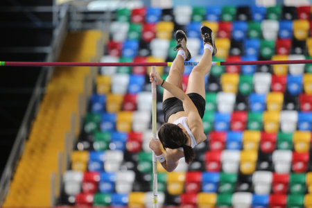ISTANBUL, TURKEY - FEBRUARY 20, 2016: Athlete Merve Baskaya pole vaulting during Turkcell Turkish Indoor Athletics Championshipsのeditorial素材