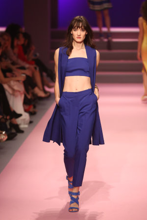 ISTANBUL, TURKEY - MARCH 01, 2016: A model showcases one of the latest creations in ADL Cengiz Abazoglu Catwalkのeditorial素材