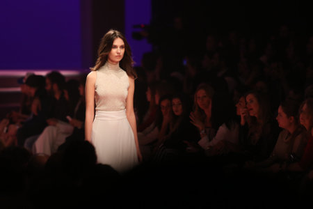 ISTANBUL, TURKEY - MARCH 01, 2016: A model showcases one of the latest creations in ADL Cengiz Abazoglu Catwalkのeditorial素材
