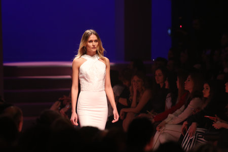 ISTANBUL, TURKEY - MARCH 01, 2016: A model showcases one of the latest creations in ADL Cengiz Abazoglu Catwalkのeditorial素材
