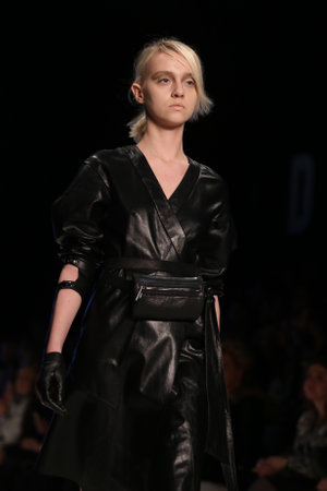 ISTANBUL, TURKEY - MARCH 18, 2016: A model showcases one of the latest creations of Tuba Ergin in Mercedes-Benz Fashion Week Istanbulのeditorial素材