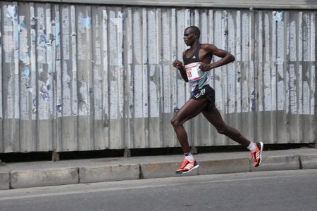 ISTANBUL, TURKEY - APRIL 24, 2016: Athlete is running in Old Town streets of Istanbul during Vodafone Istanbul Half Marathonのeditorial素材