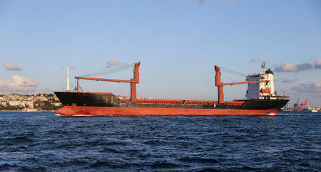 A cargo ship carrying goods between ports