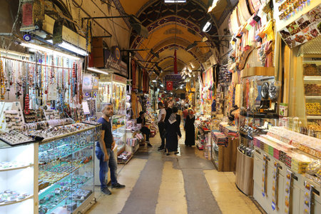 ISTANBUL, TURKEY - JULY 09, 2016: People shopping in the Grand Bazaar. The Grand Bazaar is one of...