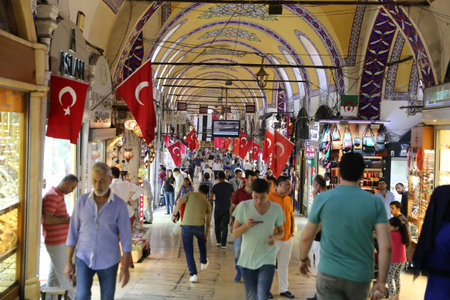 ISTANBUL, TURKEY - JULY 28, 2016: People shopping in the Grand Bazaar. The Grand Bazaar is one of...