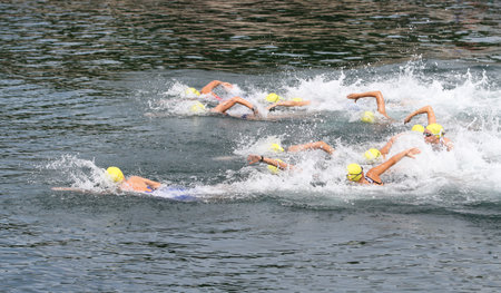 ISTANBUL, TURKEY - AUGUST 21, 2016: Athletes competing in swimming component of Istanbul Triathlon in Marmara Sea coast. 586 triathletes attempt to sixth Istanbul Thriathlon.のeditorial素材