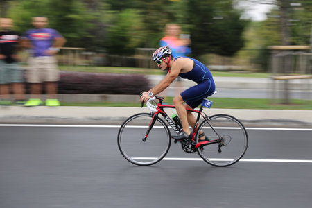 ISTANBUL, TURKEY - AUGUST 21, 2016: Athletes competing in cycling component of Istanbul Triathlon in Marmara Sea coast. 586 triathletes attempt to sixth Istanbul Thriathlon.のeditorial素材